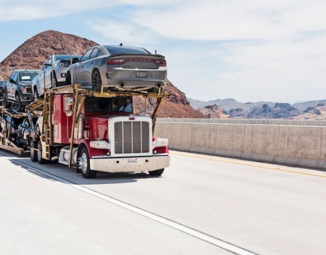 Car carrier on the Mike O'Callaghan–Pat Tillman Memorial Bridge. This bridge is bypass highway at Hoover Dam.